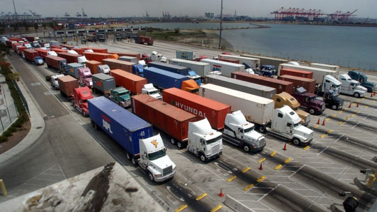 Truckers line up at the entrance of a terminal in the Port of Long Beach